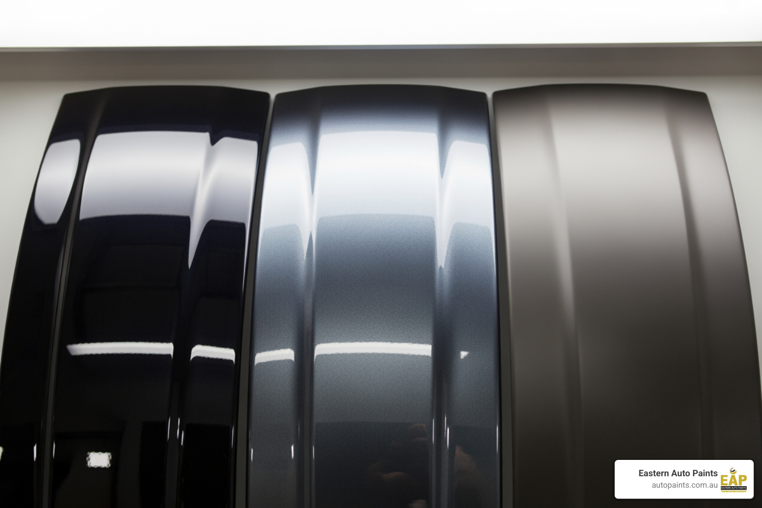 Three side-by-side car panels illustrating the variety of finishes achievable with different professional clear coat for cars: high gloss, satin, and matte.