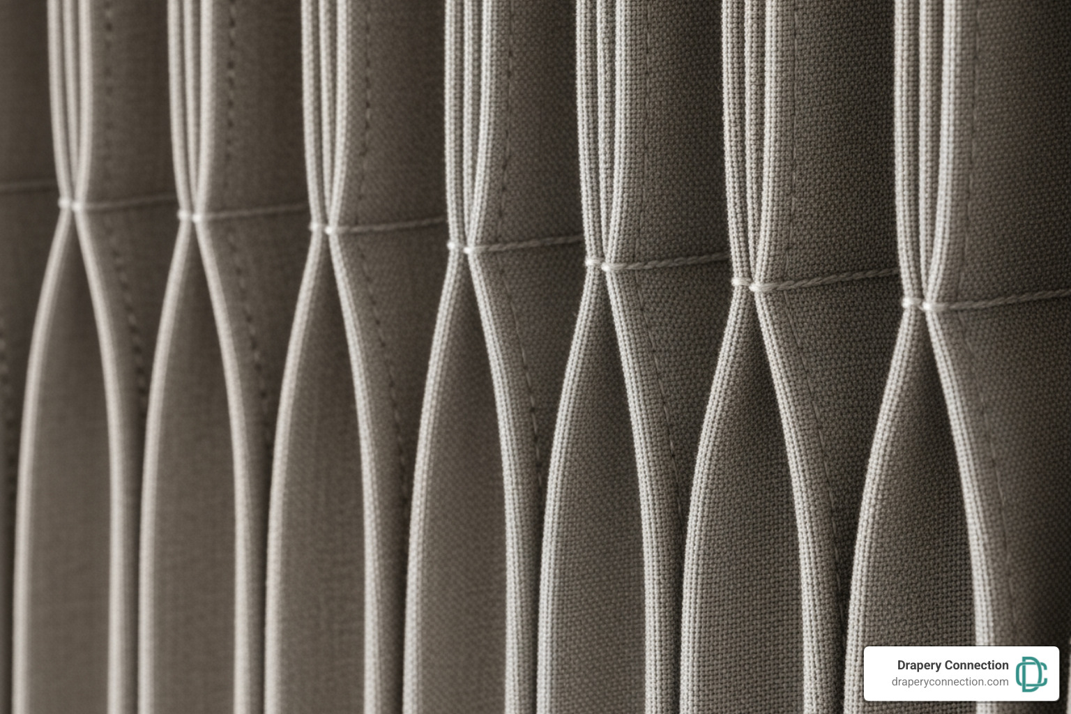 Close-up showing the detail of a triple pinch pleat - Pinch pleat drapes Close-up showing the detail of a triple pinch pleat - Pinch pleat drapes