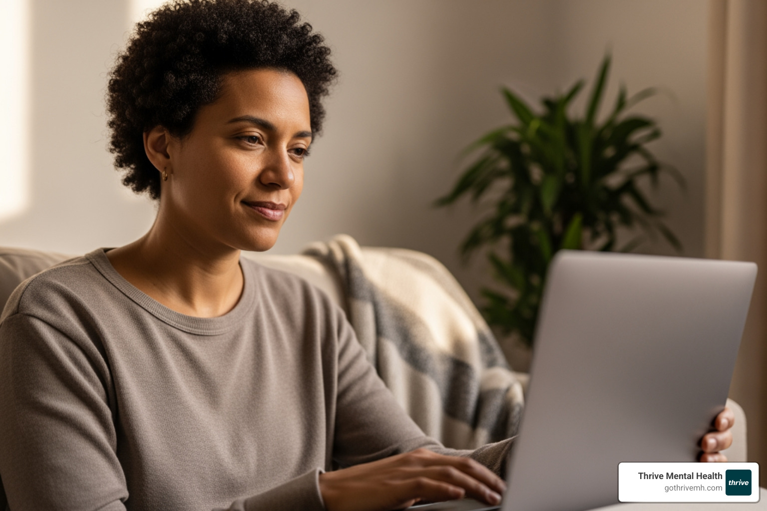 Person in virtual therapy session, feeling supported - What are the best online therapy services that offer structured programs for dealing with betrayal trauma?