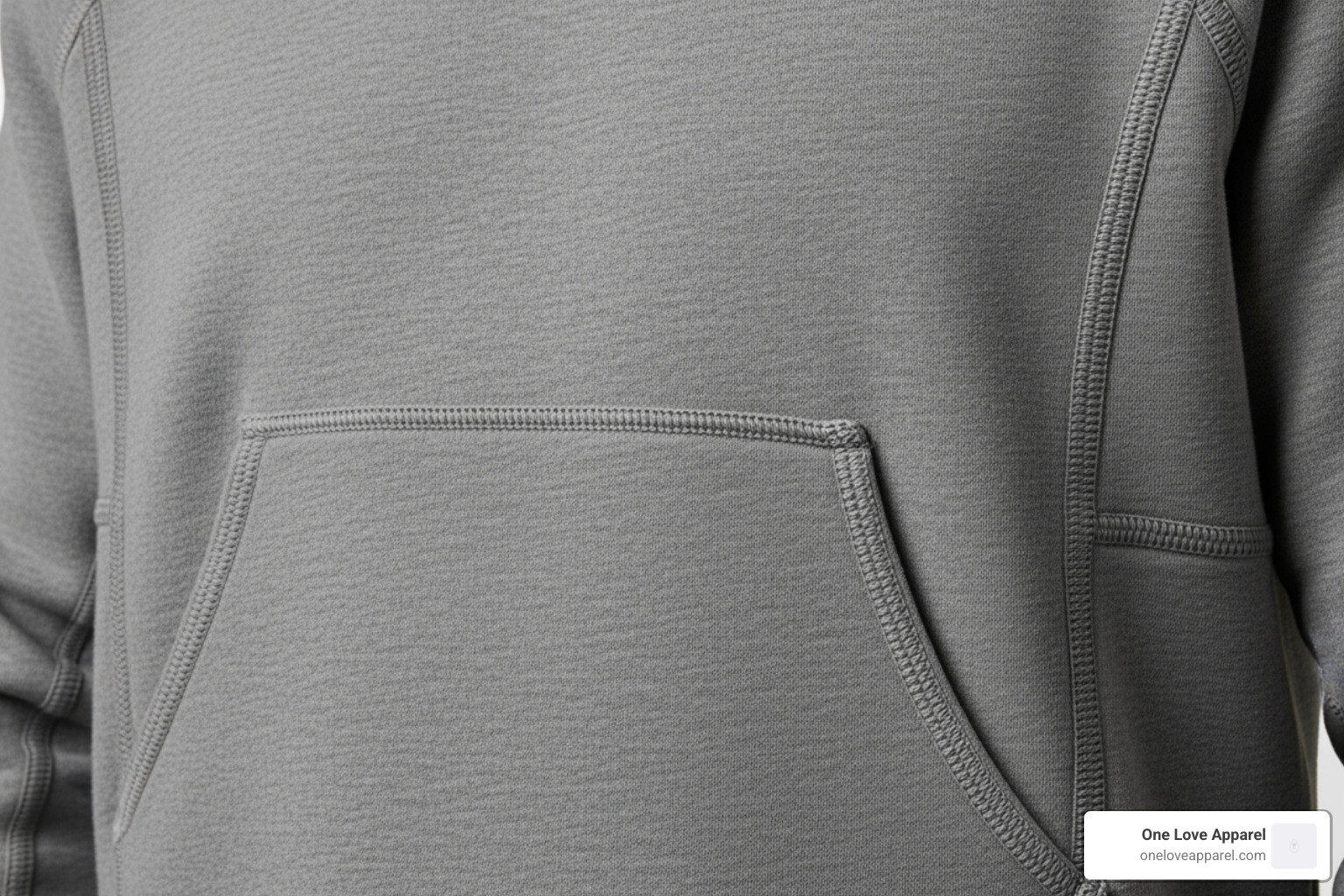 Close-up of a sweatshirt showing flatlock seams and a kangaroo pocket - men's athletic sweatshirt