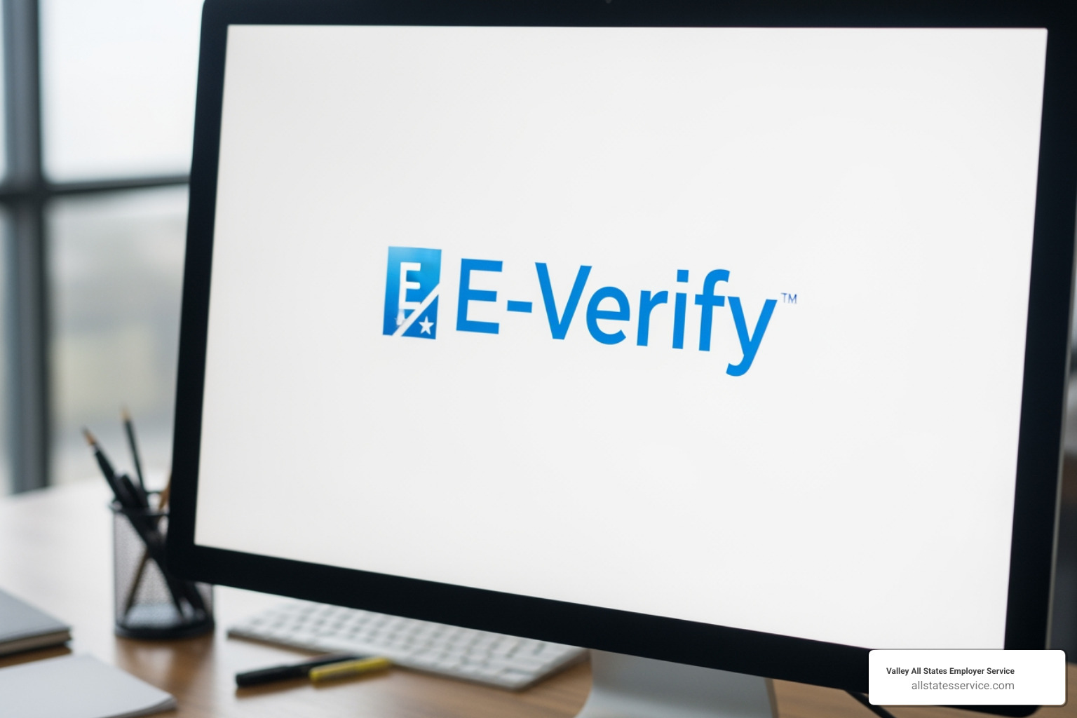 computer screen showing the E-Verify logo - E-Verify for employees
