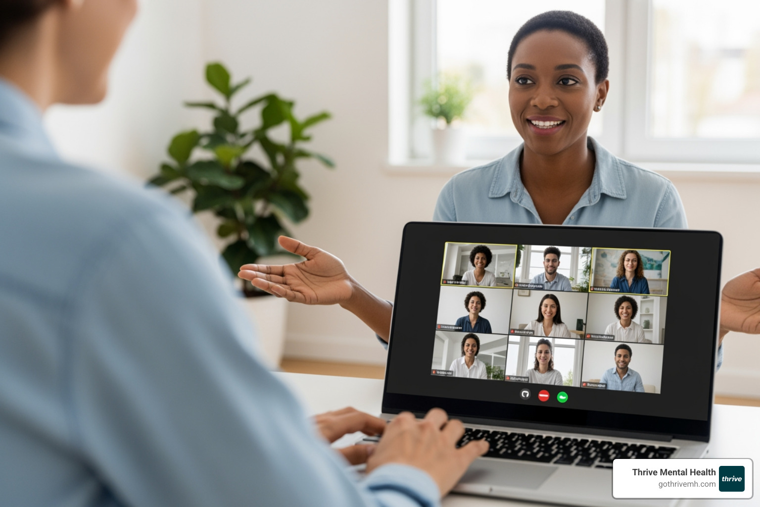 therapist leading a virtual group session on a laptop screen; Virtual IOP; PHP Programs; Evidence-based care; Measurable results - How do Thrive's mental health programs support holistic wellness?