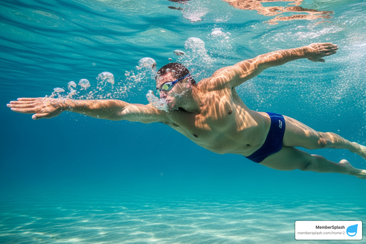 swimmer's powerful stroke underwater - lap pool membership near me