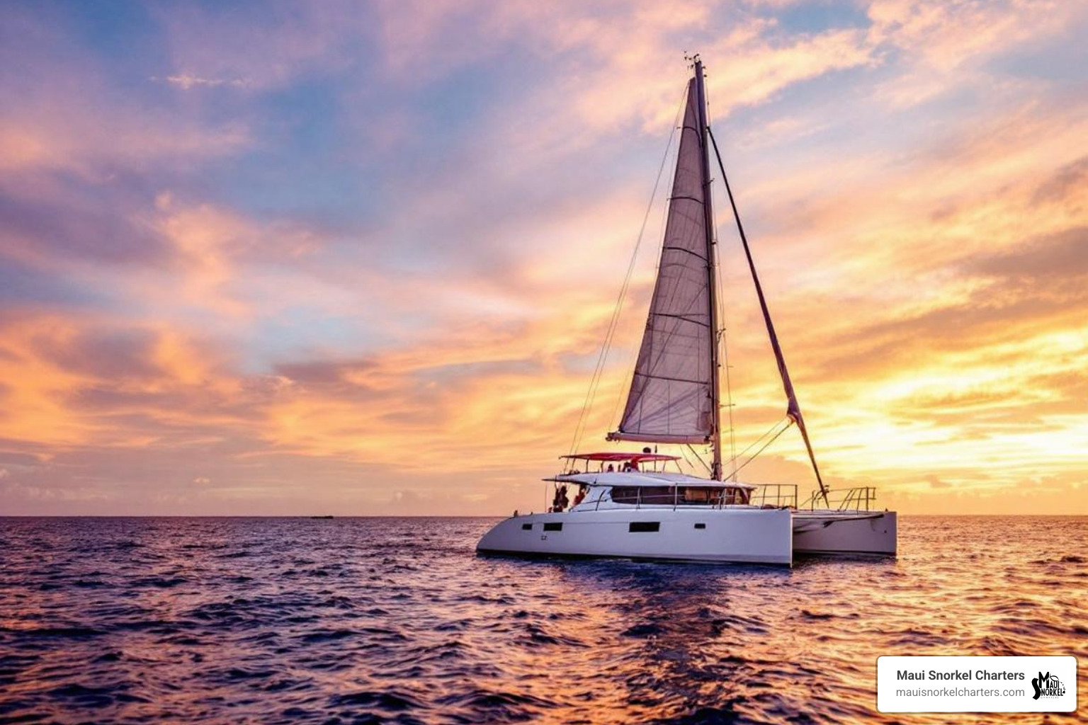 Catamaran sailing during a vibrant Maui sunset - Best Maui tours Catamaran sailing during a vibrant Maui sunset - Best Maui tours
