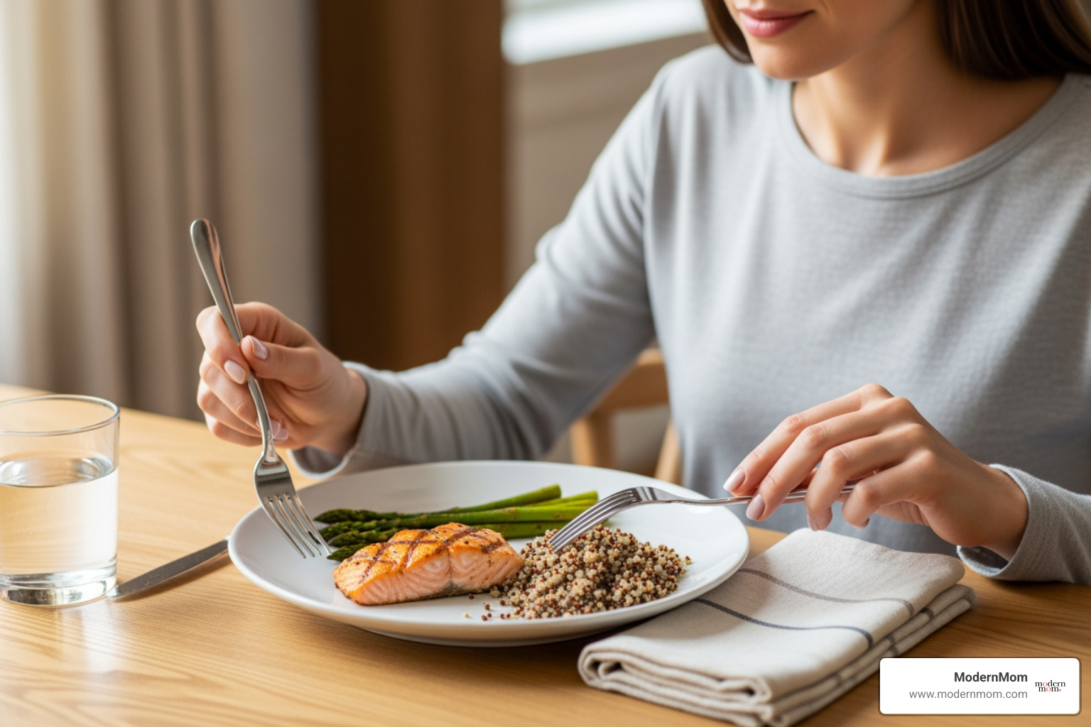 a woman putting her fork down between bites - mindful eating habits