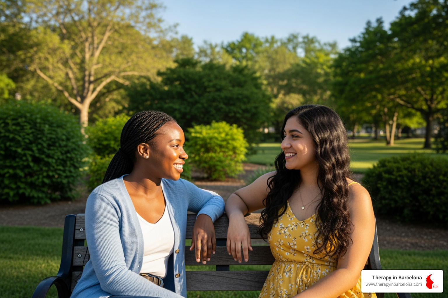 Two diverse friends having a supportive conversation in a park in Madrid - what to discuss in therapy Two diverse friends having a supportive conversation in a park in Madrid - what to discuss in therapy