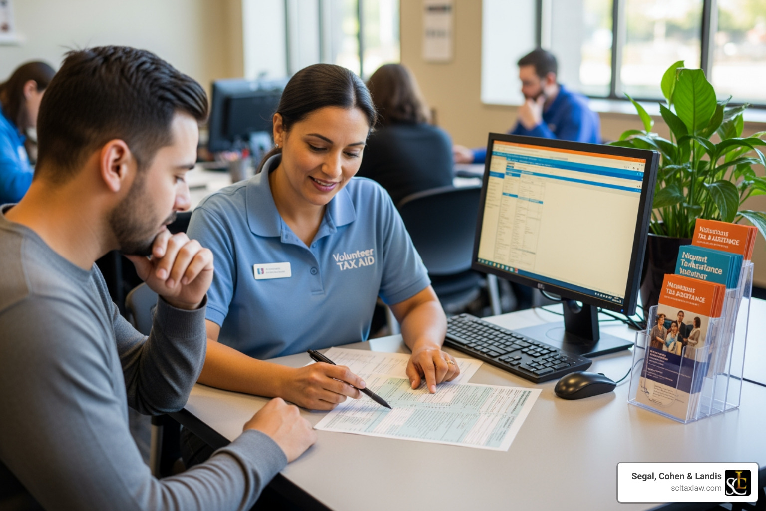 friendly volunteer assisting someone with taxes - Los Angeles tax help friendly volunteer assisting someone with taxes - Los Angeles tax help