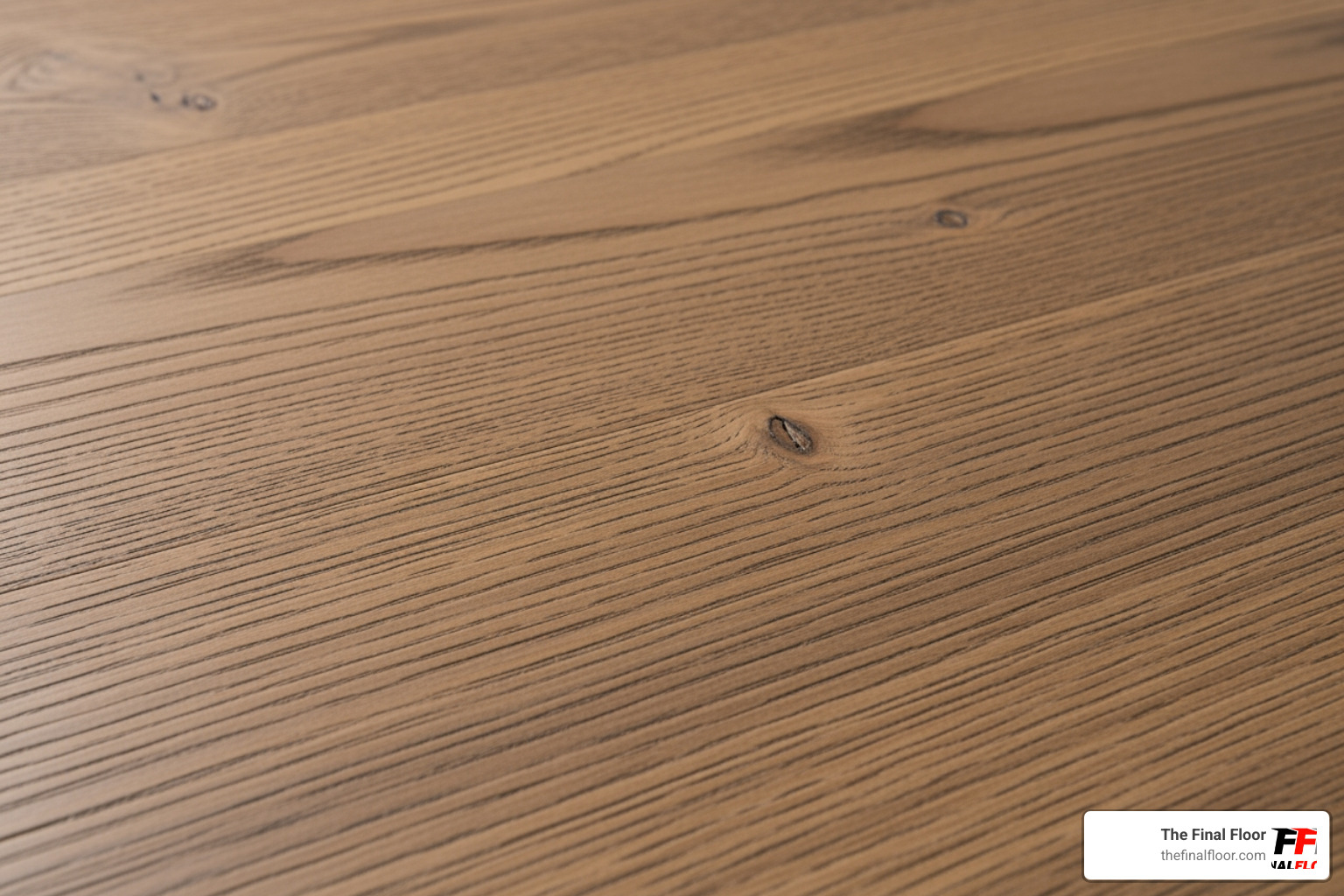 Close-up of a durable, wire-brushed hardwood floor texture, showing subtle variations in grain and color - best hardwood floors