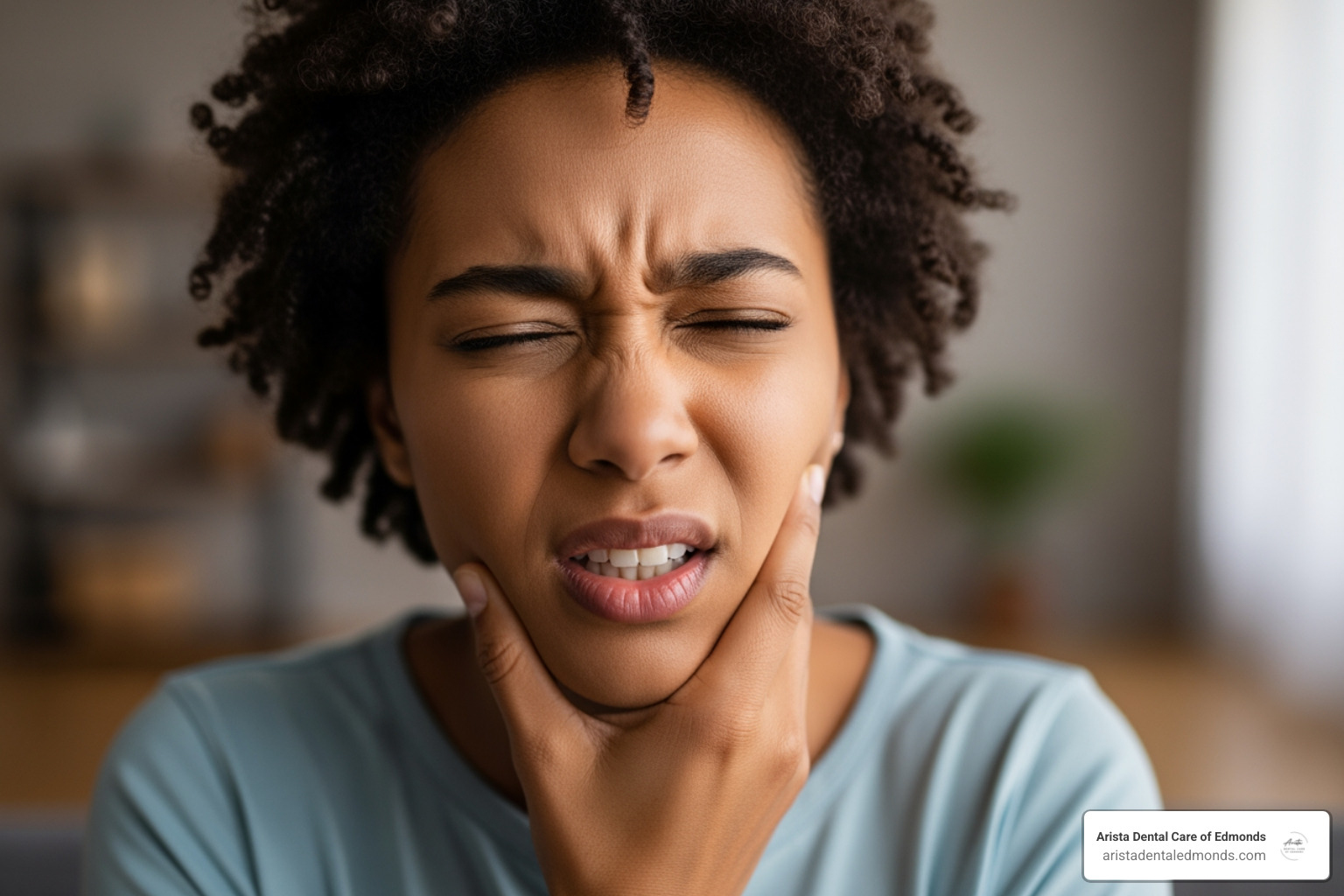 person holding their jaw in pain - emergency dental care wa