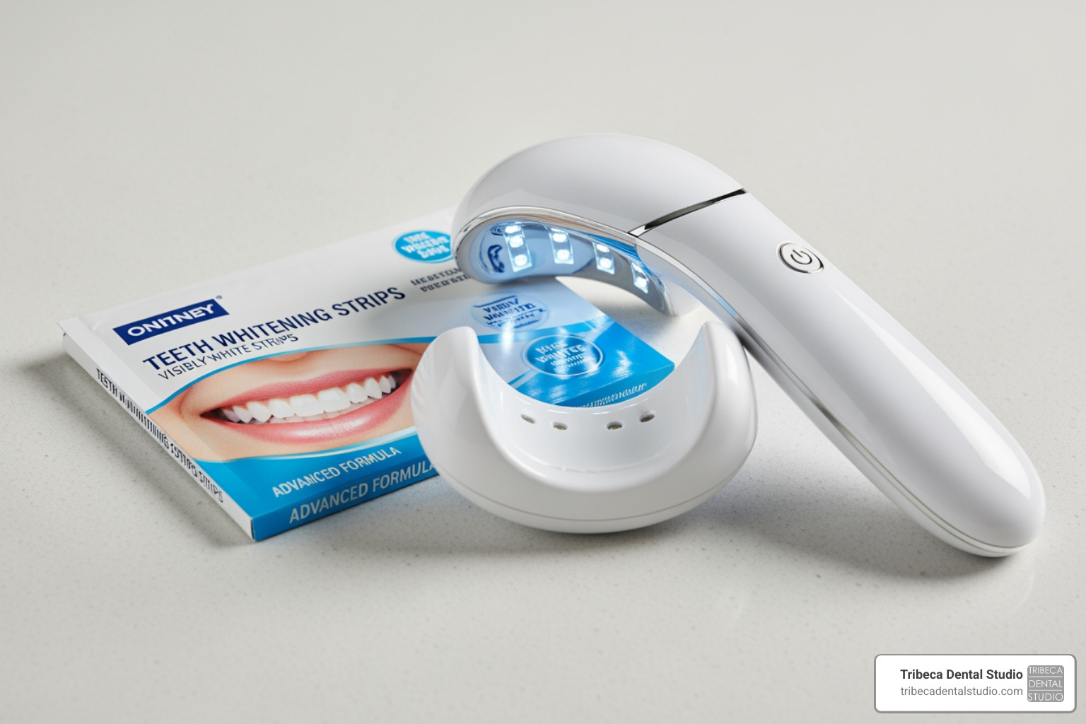 whitening strips package next to a handheld LED light device - best whitening for sensitive teeth