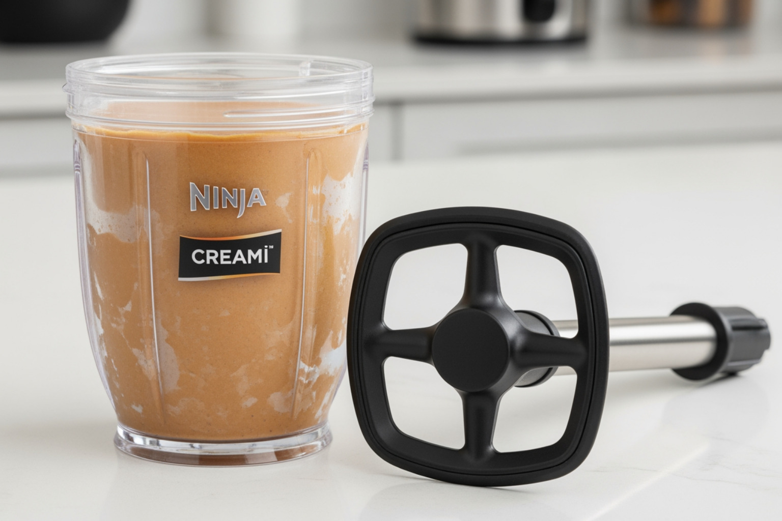 Creamerizer paddle and a frozen pint container - ninja creami Creamerizer paddle and a frozen pint container - ninja creami
