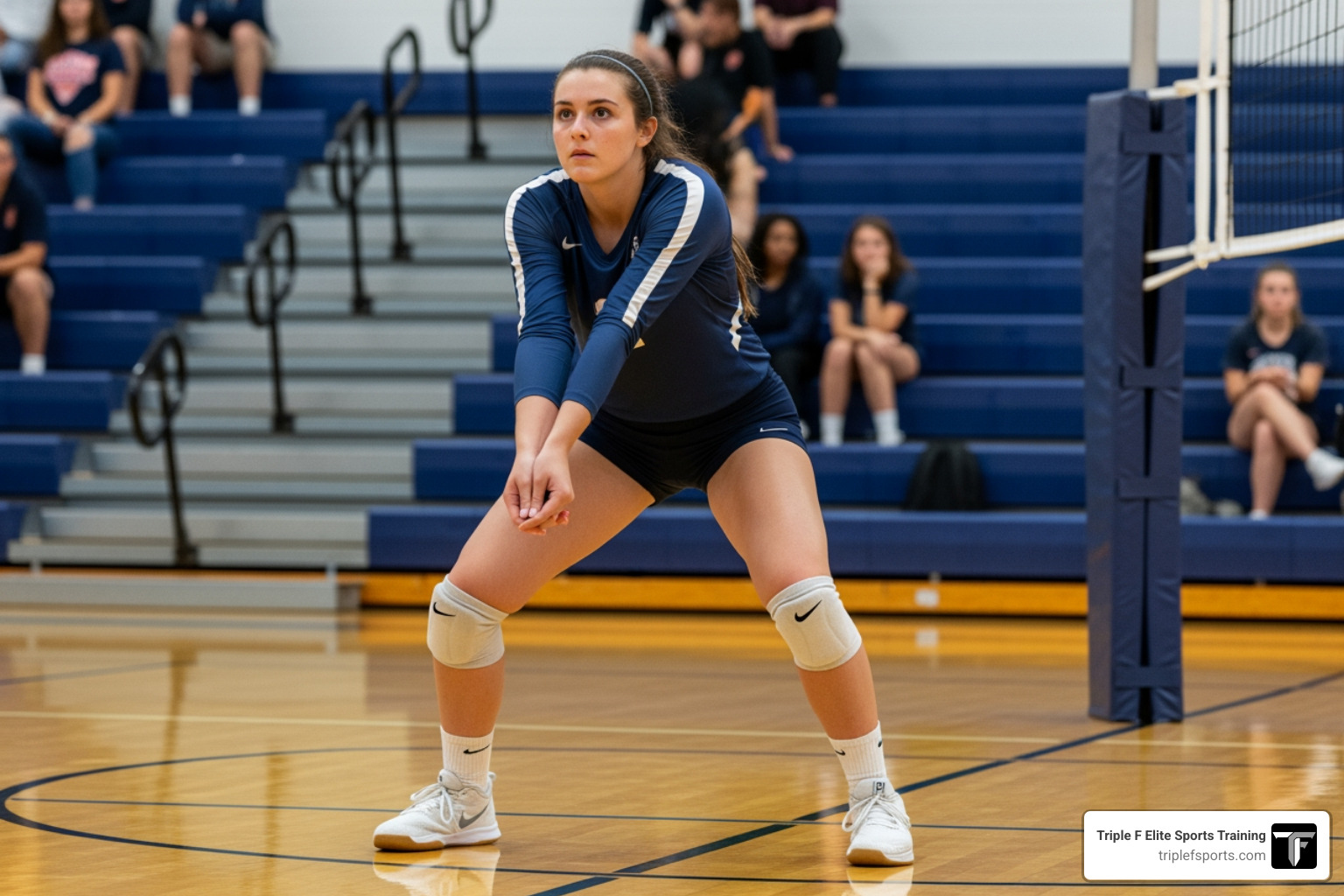 a libero in a perfect serve receive stance with a focused gaze and a locked platform - volleyball libero camps near me a libero in a perfect serve receive stance with a focused gaze and a locked platform - volleyball libero camps near me