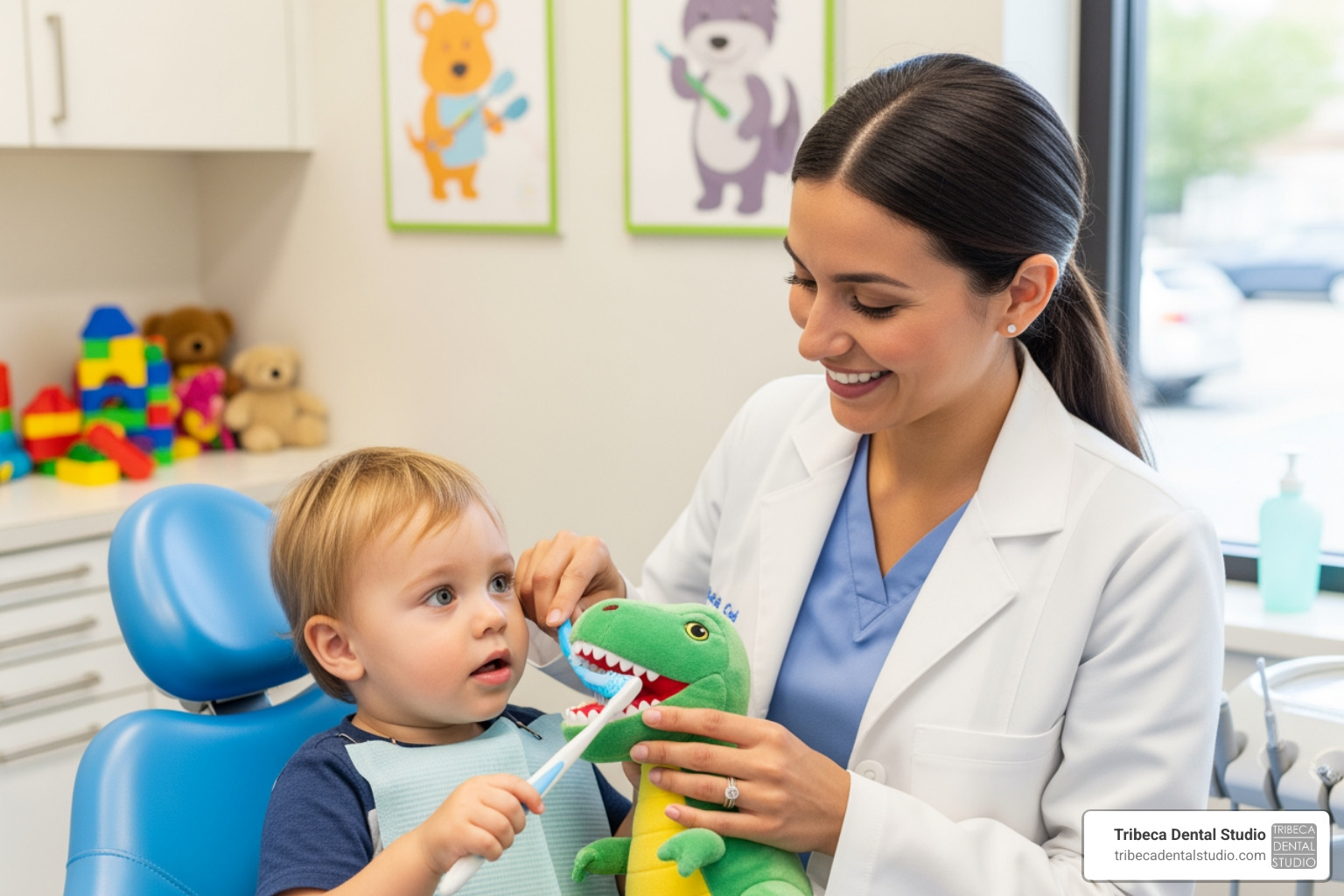 A board-certified pediatric dentist showing a toddler how to brush a dinosaur's teeth - pediatric dentist in brooklyn new