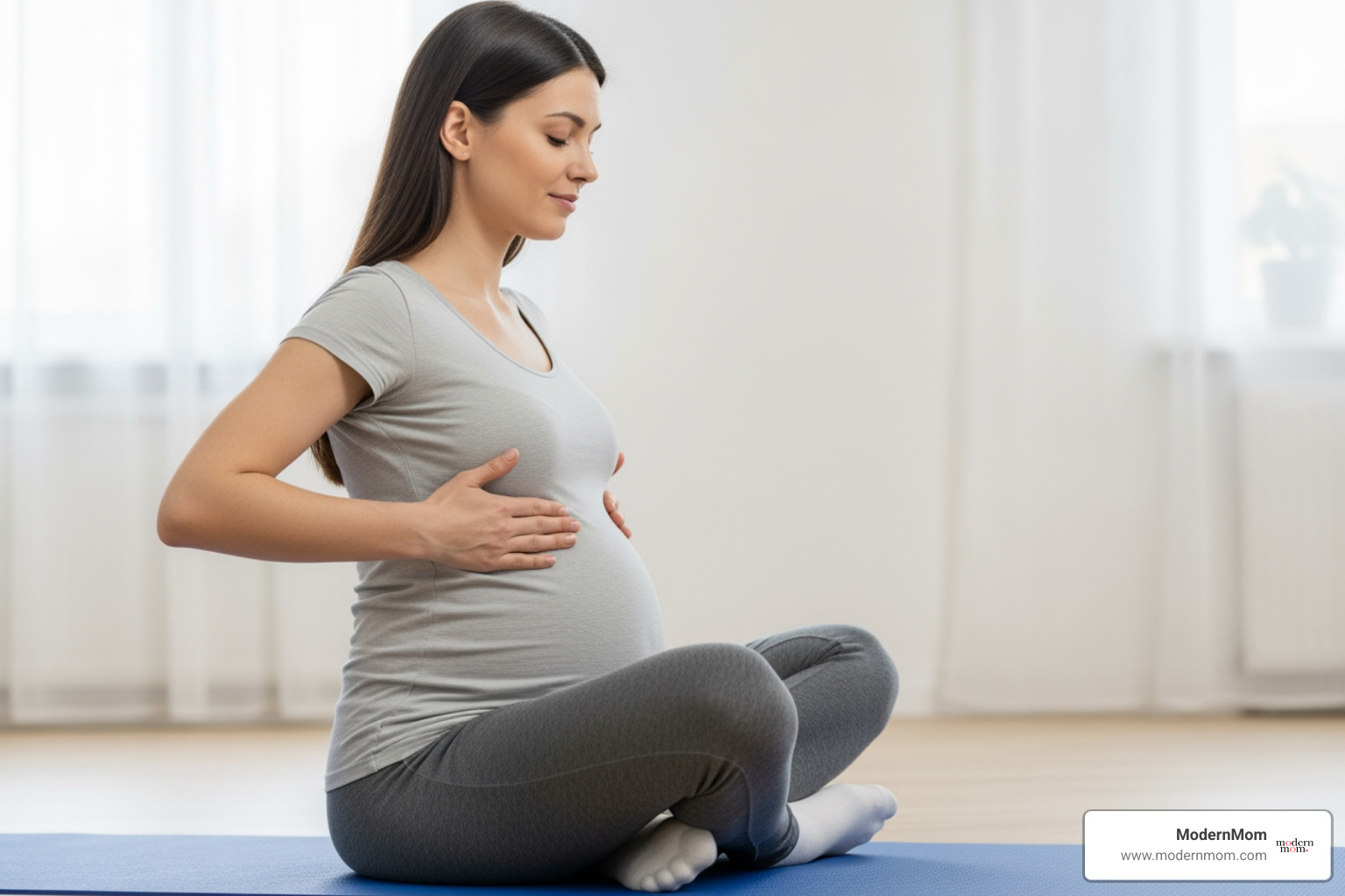 Mother practicing 360-degree ribcage expansion breathing while seated - postpartum ab routine