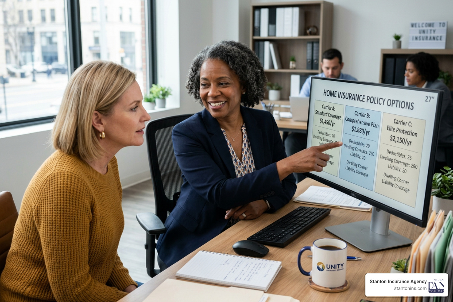 Agent reviewing multiple policy options on a screen for a client - independent home insurance companies Agent reviewing multiple policy options on a screen for a client - independent home insurance companies