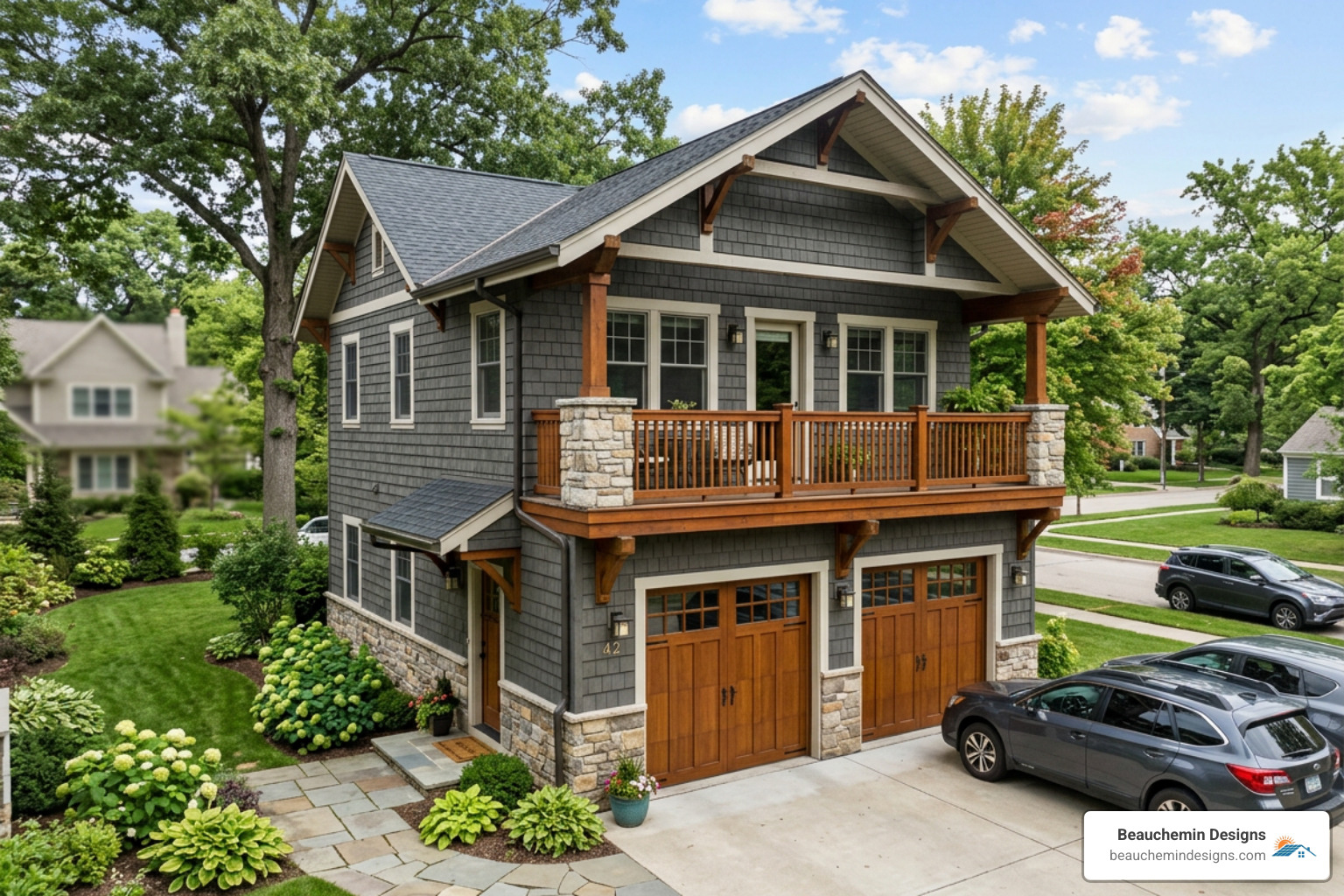 A Craftsman-style garage apartment with shingle siding and a second-story balcony - 2 car garage with 2 bedroom apartment A Craftsman-style garage apartment with shingle siding and a second-story balcony - 2 car garage with 2 bedroom apartment