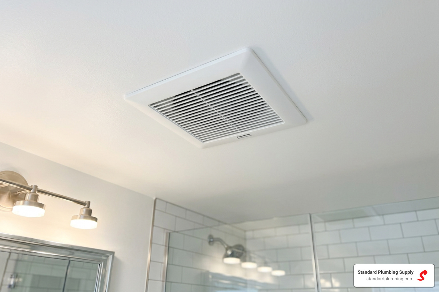 modern bathroom exhaust fan installed in a clean white ceiling - bathroom air fan