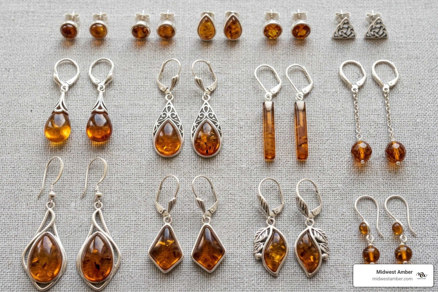 Various styles of sterling silver amber earrings including studs, dangles, and drops - Sterling silver amber earrings Various styles of sterling silver amber earrings including studs, dangles, and drops - Sterling silver amber earrings