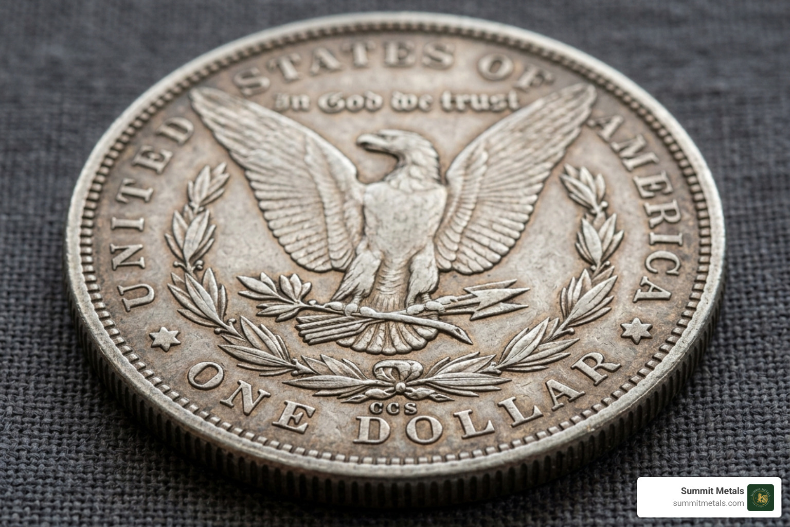 close-up of mint mark locations on the reverse of a Morgan dollar - selling silver dollar coins