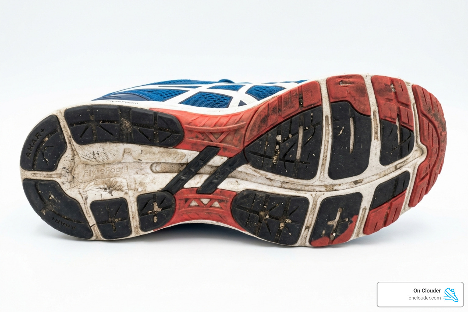 Close-up of a running shoe outsole showing heavy wear on the outer lateral edge - best running shoes for supinators