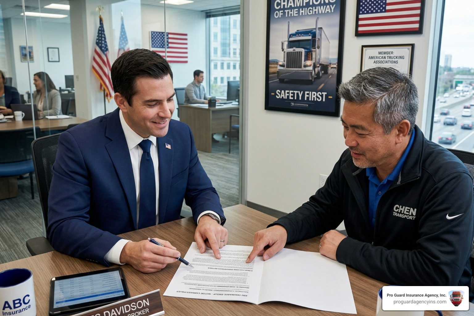 Insurance broker reviewing a policy with a fleet owner to ensure proper cargo coverage - load securement insurance policy
