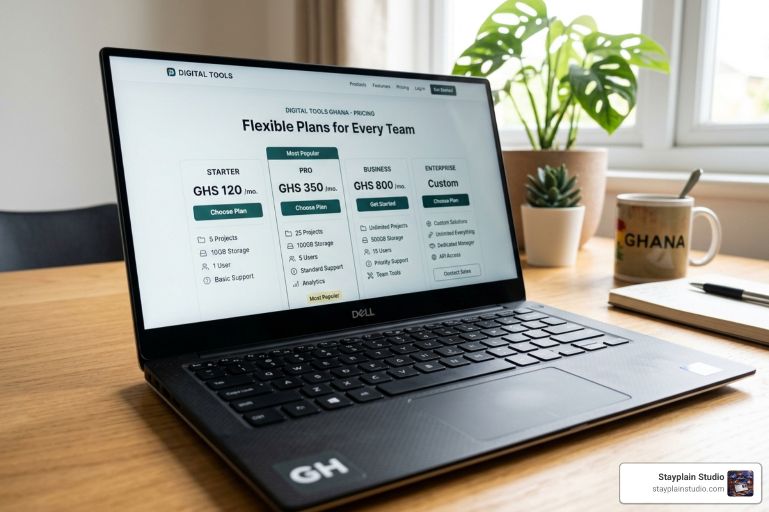 website pricing table on laptop - how much does website design cost in ghana