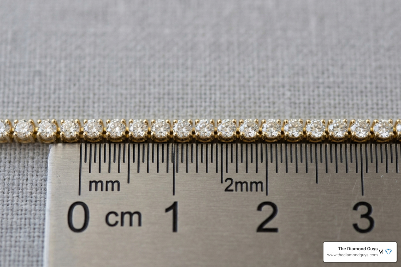 2mm width of a diamond tennis bracelet shown against a ruler for scale - 2mm diamond tennis bracelet