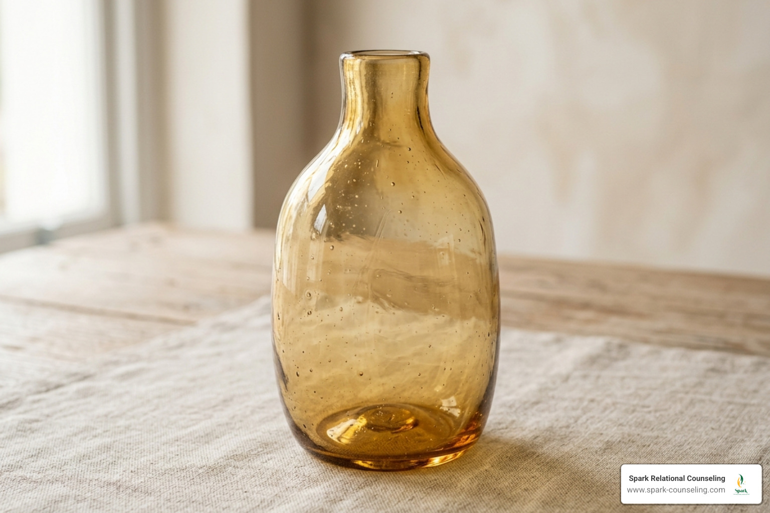 Minimalist amber glass representing transparency and fragility - couples therapy for intimacy issues Minimalist amber glass representing transparency and fragility - couples therapy for intimacy issues