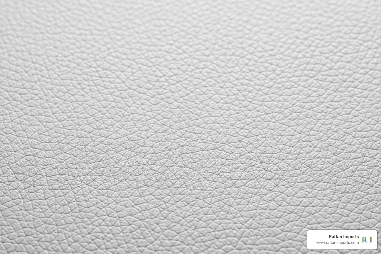 Close up of top-grain white leather texture showing natural grain and soft finish Close up of top-grain white leather texture showing natural grain and soft finish