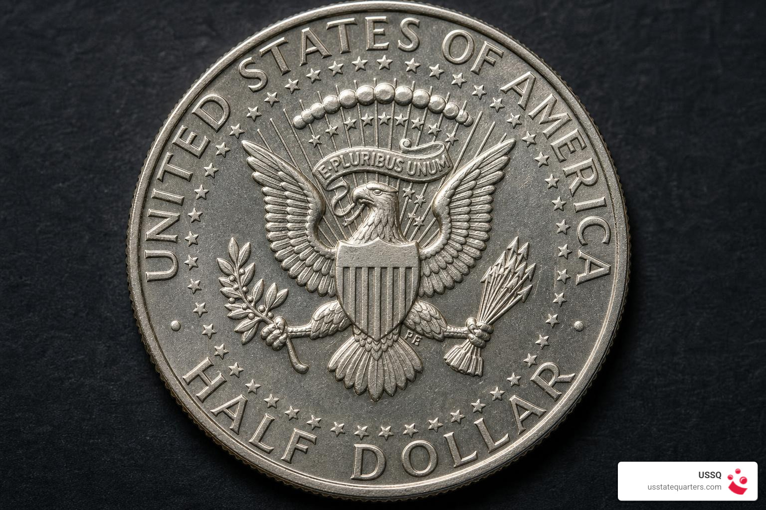 Kennedy half dollar reverse highlighting eagle, shield, arrows, olive branch, and stars