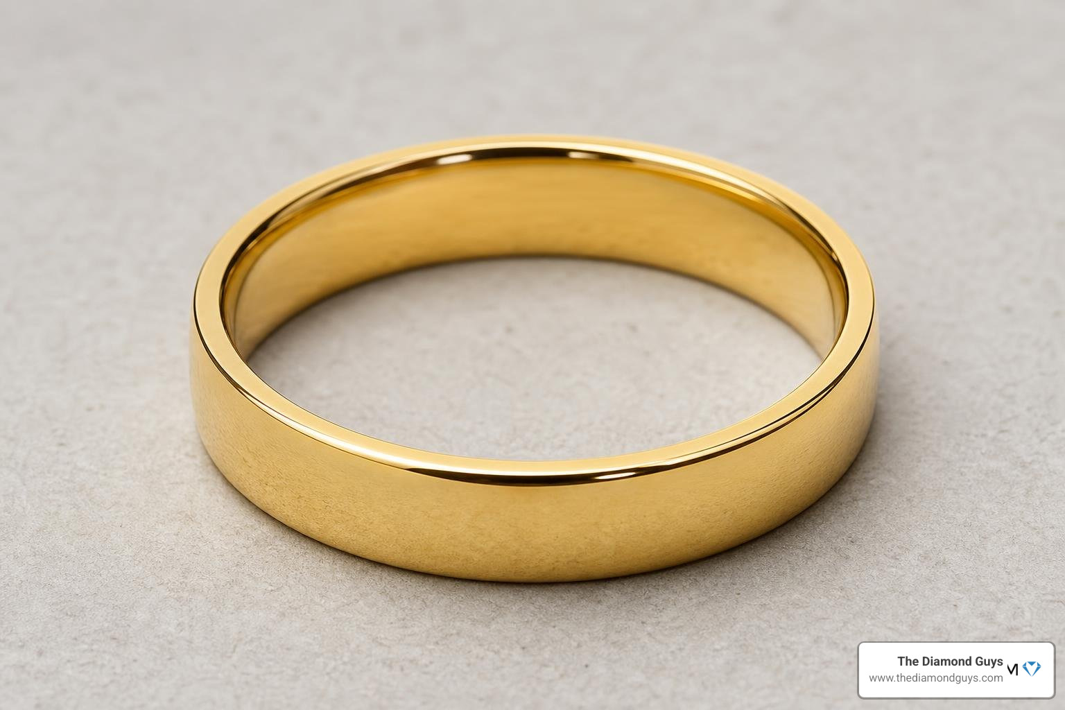 A classic 4 mm flat band ring crafted in pure yellow gold showing its rich luster