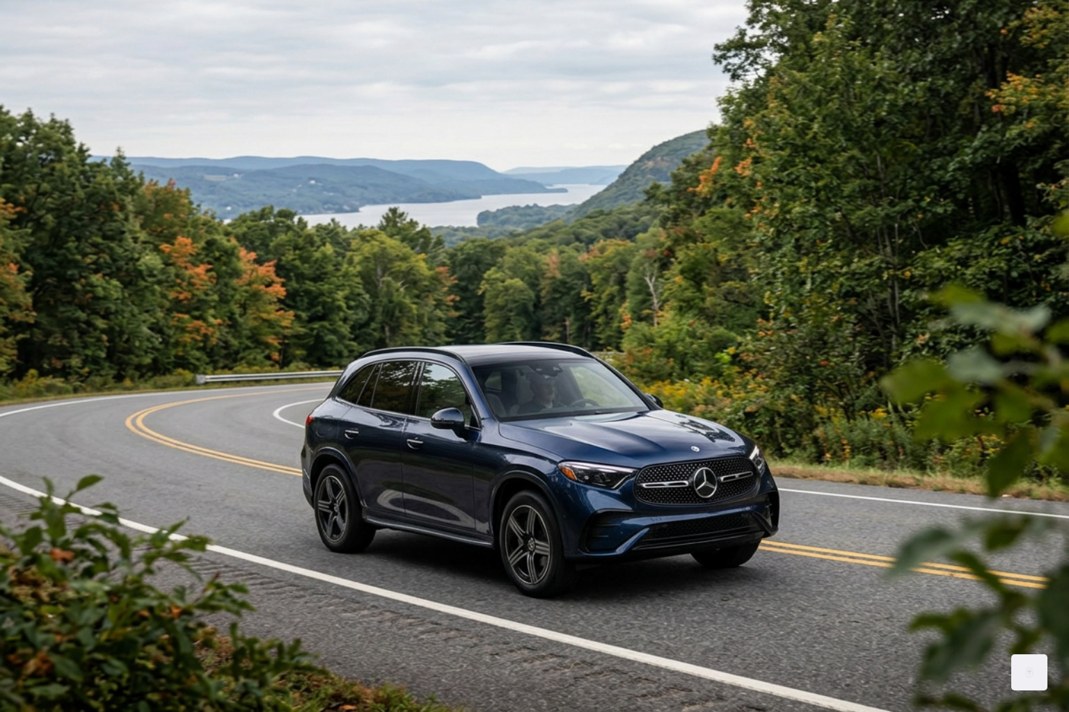 A new 2026 Mercedes-Benz GLC driving through the scenic Hudson Valley A new 2026 Mercedes-Benz GLC driving through the scenic Hudson Valley