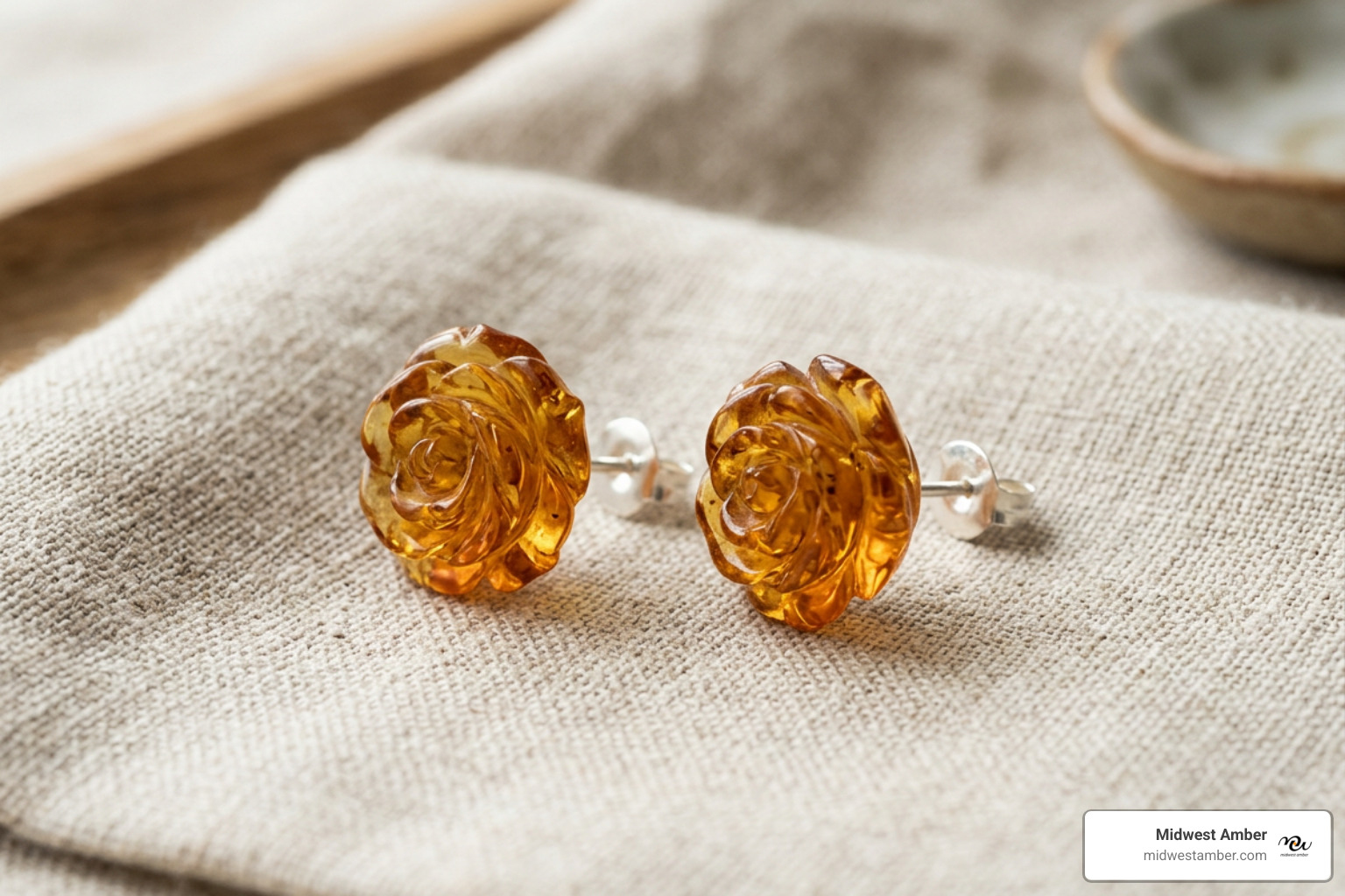 carved amber rose earrings made of Baltic amber