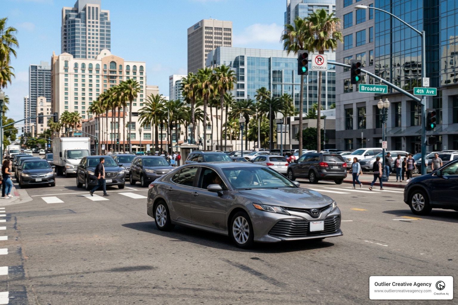 Rideshare vehicle driving through a high-traffic downtown San Diego intersection