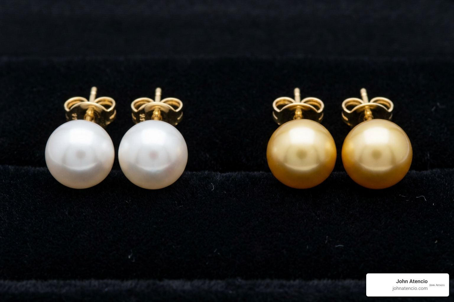 White and golden South Sea pearl stud earrings side by side in solid gold mountings