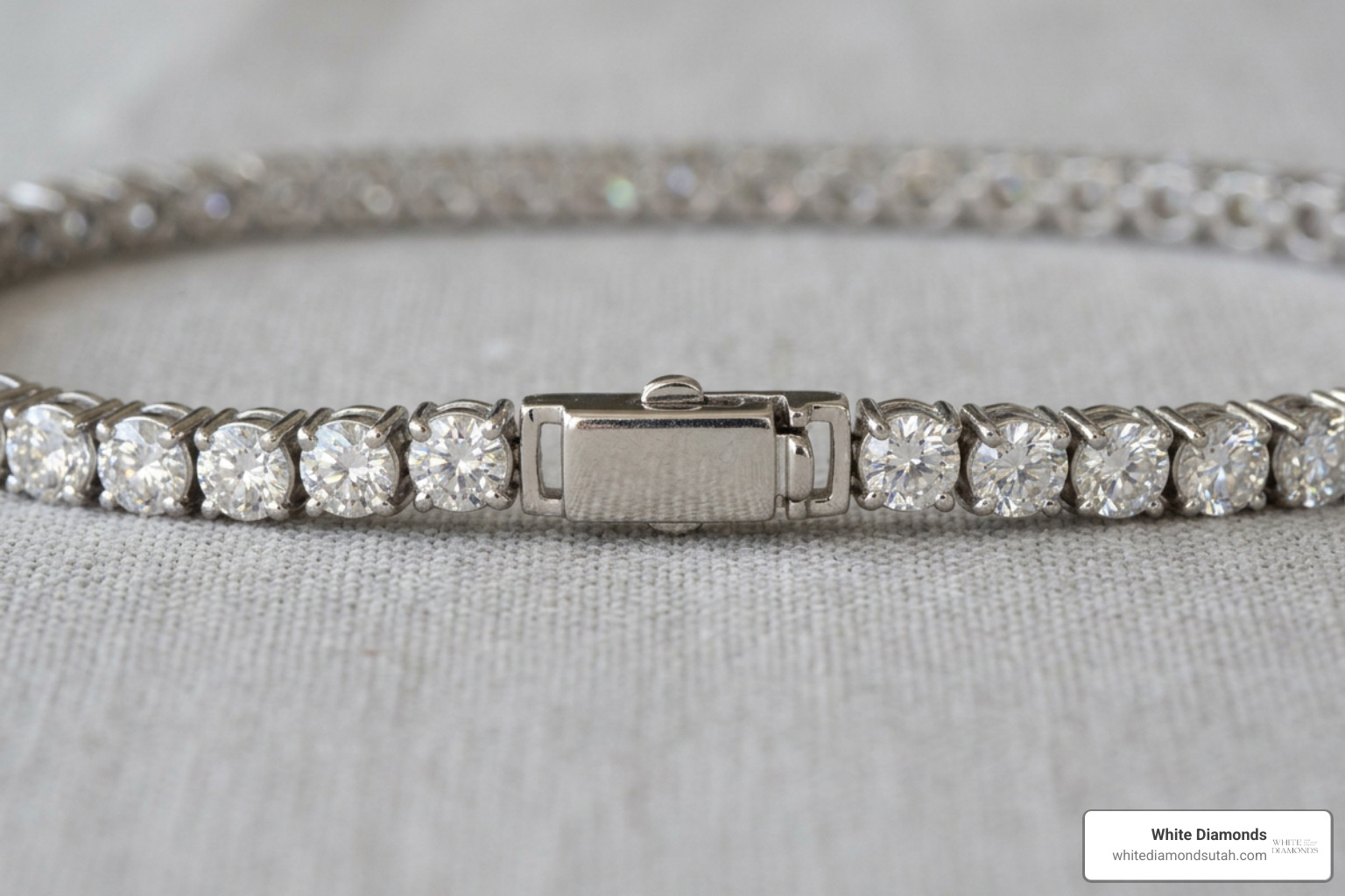 Close-up of four-prong diamond settings and robust box clasp on a 20 pointer tennis chain Close-up of four-prong diamond settings and robust box clasp on a 20 pointer tennis chain