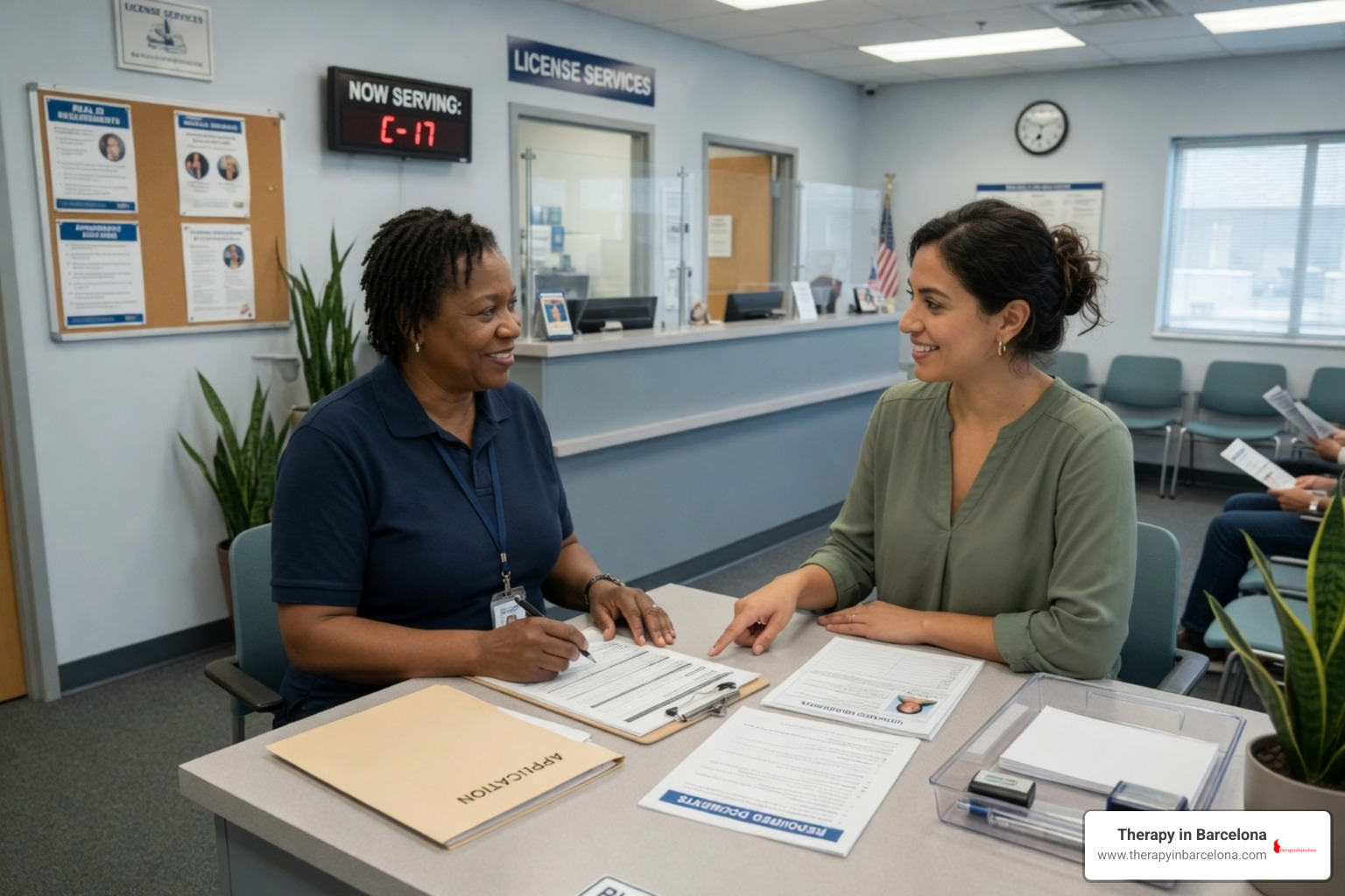 An expat sitting with an official at a driver licensing office counter reviewing forms
