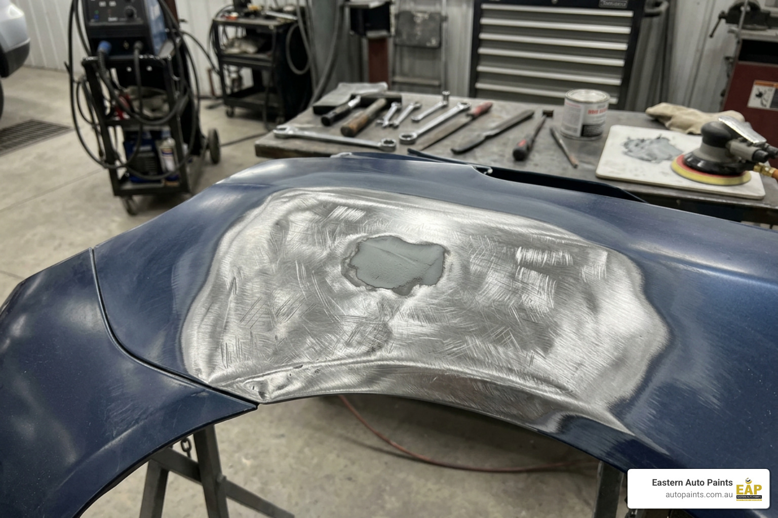 Car panel prepped for body filler repair