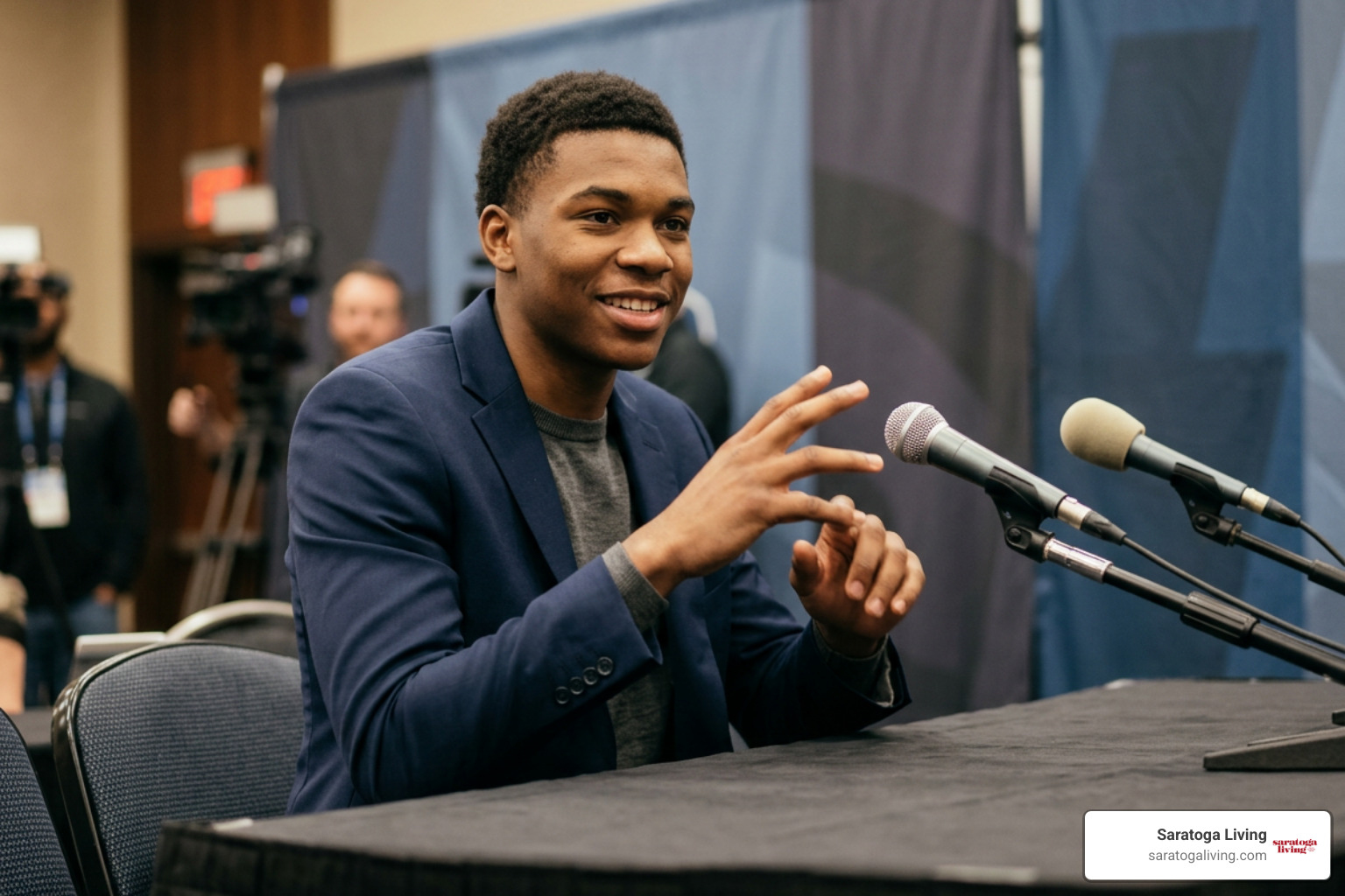Carter Bryant signing in American Sign Language during an interview