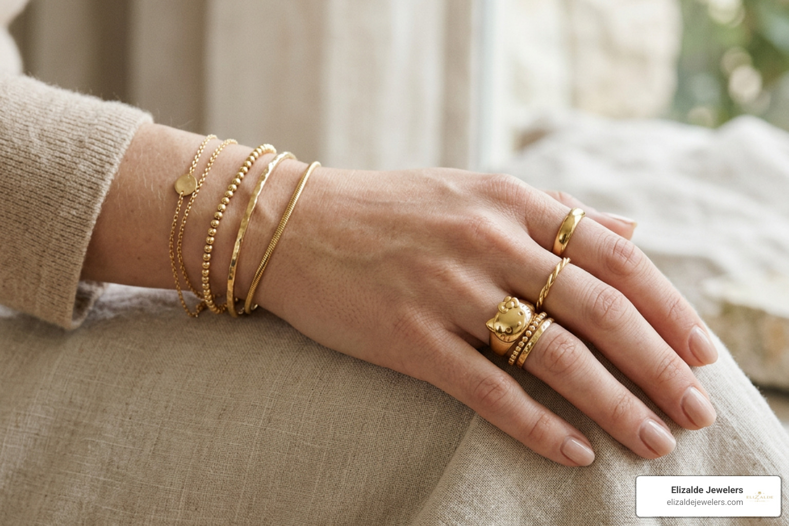 Stacked gold character rings and matching bracelets