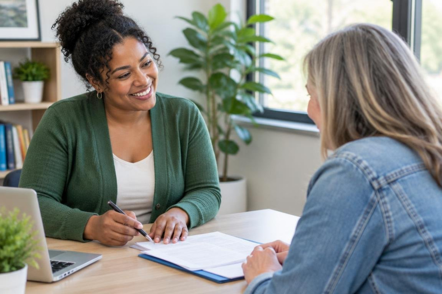 Supportive housing coordinator assisting a resident Supportive housing coordinator assisting a resident