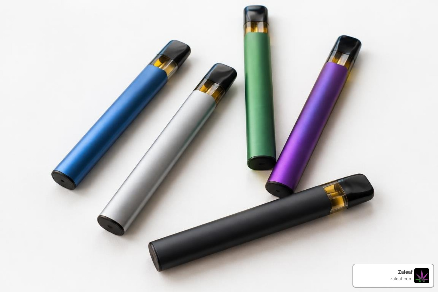 disposable cannabinoid vape pens on a minimalist surface