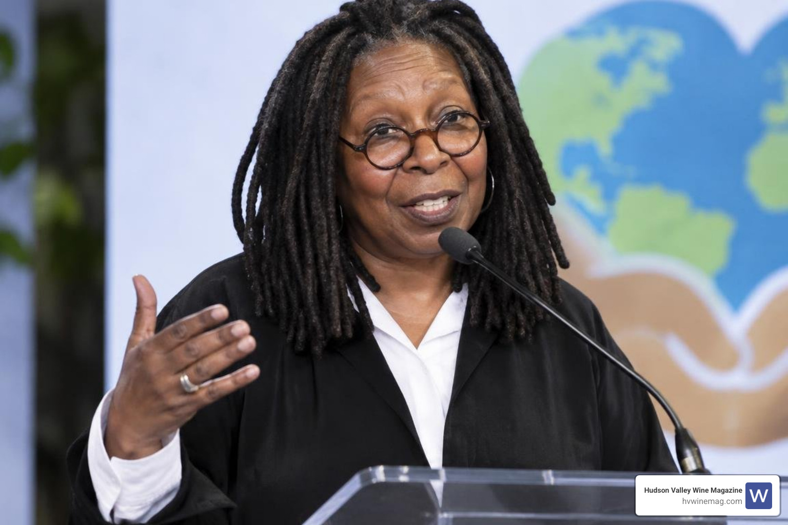Whoopi Goldberg speaking at a humanitarian event Whoopi Goldberg speaking at a humanitarian event