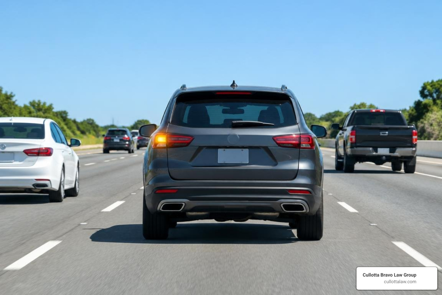 passenger vehicle signaling a highway lane change